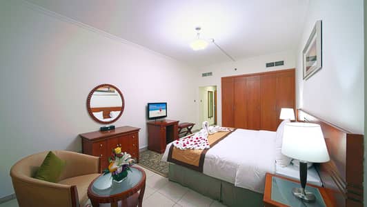 1 Bedroom Hotel Apartment for Rent in Bur Dubai, Dubai - 1BR - MASTER BEDROOM. jpg