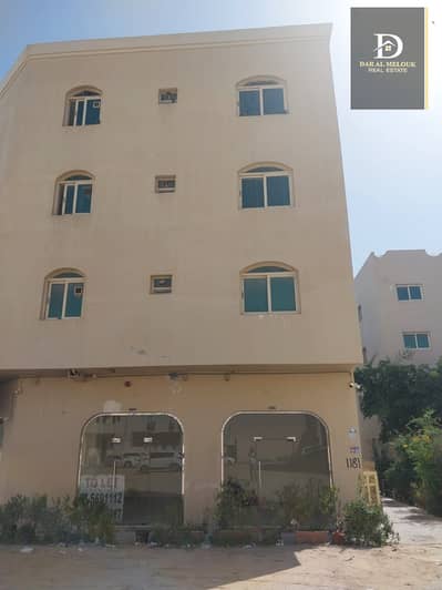 For sale in Sharjah, Muwailih commercial area, residential and commercial building, area of 2630 feet, corner on two streets, ground permit, 3 floors, consisting of 5 shops, 9 rooms and a hall. Current income is 227 thousand. Central air conditioning. A