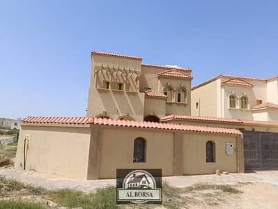 Villa for sale in Ajman, one of the most luxurious villas in Al Mowaihat, freehold for all nationalities, 5 rooms + maids room, area of 5000 feet,