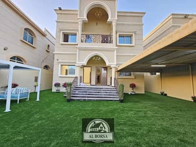 A luxurious villa for sale in Al Mowaihat 1, 5 master rooms, a sitting room, a kitchen, and a maids room with electricity and air conditioning.