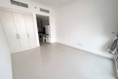 Studio for Rent in DAMAC Hills, Dubai - Multiple Cheques | Balcony | White Goods Included