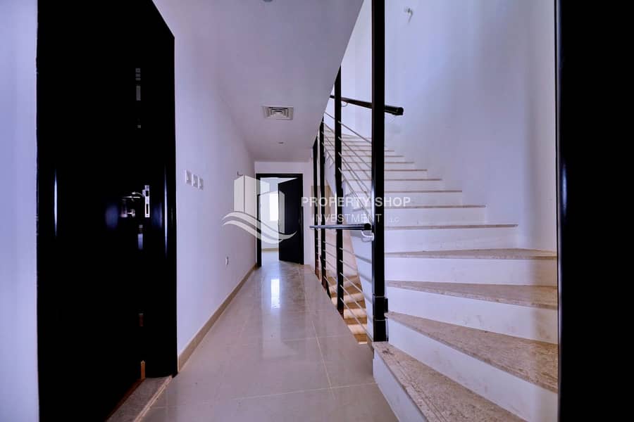 8 3-bedroom-villa-abu-dhabi-al-reef-desert-village-corridor. JPG