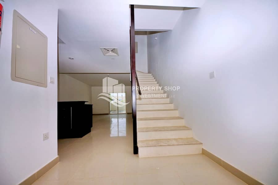 9 3-bedroom-villa-abu-dhabi-al-reef-desert-village-stairs. JPG