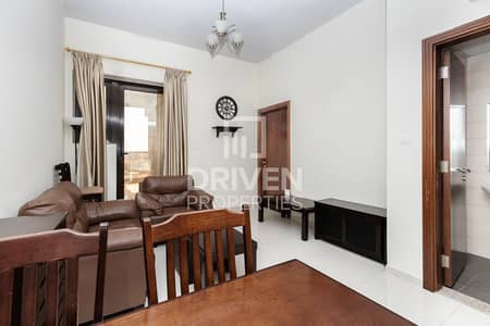 1 Bedroom Apartment for Sale in Dubai Sports City, Dubai - Fully Furnished and Bright | Community View