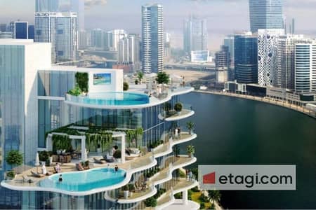 1 Bedroom Apartment for Sale in Business Bay, Dubai - Canal View | Branded by De Grisogono | Invest Now