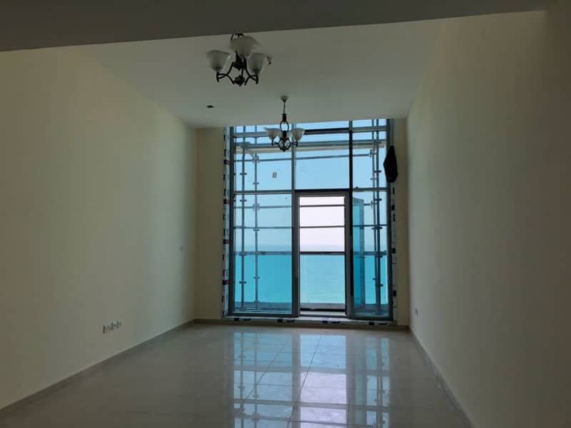 HOT OFFER !!! SEA VIEW 1BHK FOR SALE IN LUXURIOUS TOWER AT AJMAN CORNICHE WITH 5 YEAR PAYMENT PLAN