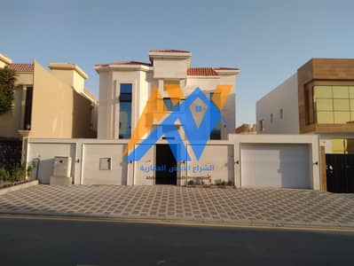 Villa for sale in Ajman, Al Rawda 1, with water and electricity. The villa has 6 rooms with very excellent sizes, a stone facade, super luxury finishi