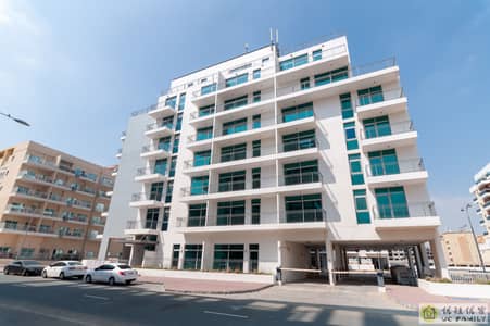 1 Bedroom Flat for Rent in International City, Dubai - Building-8. jpg