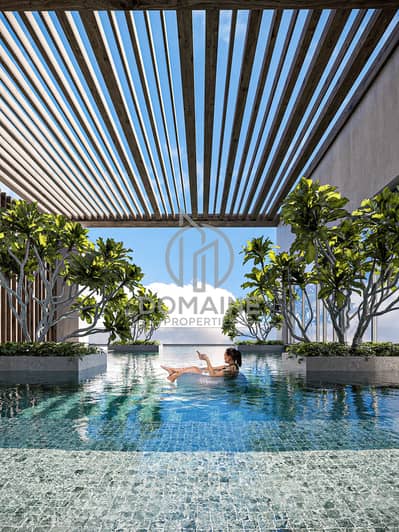 2 Cпальни Апартамент Продажа в Джумейра Вилладж Серкл (ДЖВС), Дубай - 10 q gardens pool_day_View10. jpg