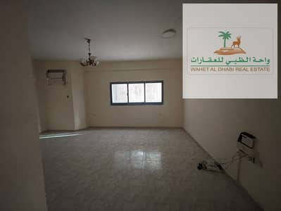 The most beautiful apartment in Al Majaz for annual rent, two rooms and a hall with a balcony Open view - wall cabinets