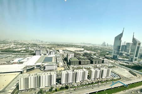 شقة 2 غرفة نوم للايجار في شارع الشيخ زايد، دبي - شقة في برج بارك بليس،شارع الشيخ زايد 2 غرف 155000 درهم - 8924022
