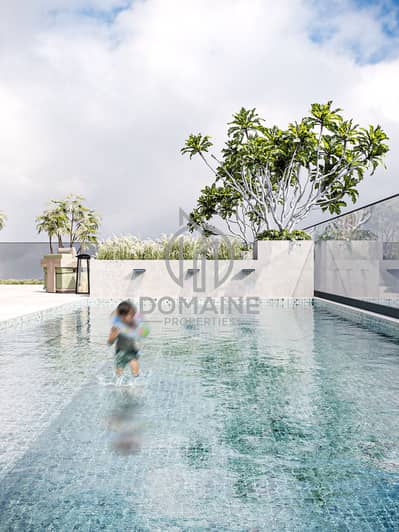 2 Cпальни Апартаменты Продажа в Джумейра Вилладж Серкл (ДЖВС), Дубай - 08 q gardens pool_day_View03. jpg