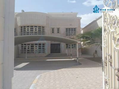 7 Bedroom Villa Compound for Sale in Al Shamkha, Abu Dhabi - own a compound of 4 villas in a prime location