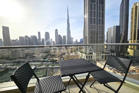 فلیٹ 2 غرفة نوم للايجار في وسط مدينة دبي، دبي - شقة في برج فيوز A،برج فيوز،وسط مدينة دبي 2 غرف 199000 درهم - 8926043