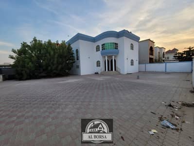 Villa for rent, area of 10,000 square feet in Ajman, Al Rawda area 2, corner on two streets, price is negotiable