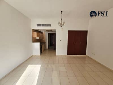Studio for Rent in International City, Dubai - 1d4e5669-b275-4cc4-b30d-43415f5b1ccf. jpg