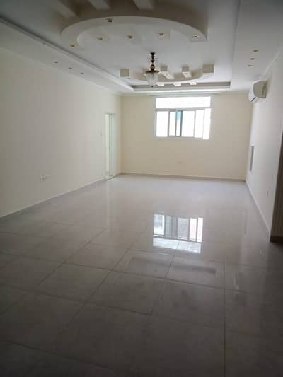 4 Four rooms and a large hall with 3 bathrooms, two master rooms and two balcony in Al Jurf 2. The price is 65 thousand dirhams annually, non-payable
