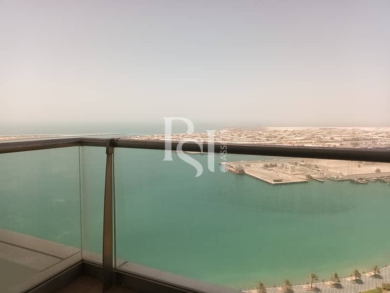 2 al-reef-tower-corniche-abu-dhabi-balcony-view (1). JPG