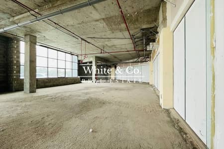 Shop for Sale in Dubai Investment Park (DIP), Dubai - Shell and Core | Road Facing | Vacant