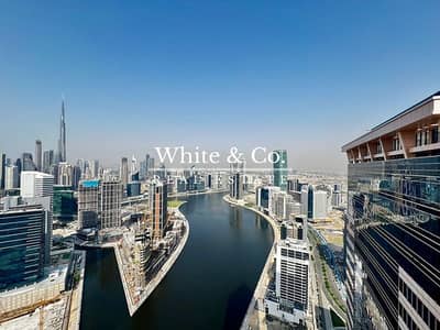 2 Bedroom Flat for Sale in Business Bay, Dubai - High Floor | Vacant | Canal and Burj View