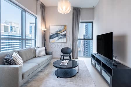 فلیٹ 1 غرفة نوم للايجار في وسط مدينة دبي، دبي - شقة مفروشة في وسط المدينة مع إطلالات جزئية على القناة!