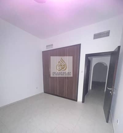2 Bedroom Flat for Rent in Al Nuaimiya, Ajman - For annual rent in Ajman, exclusive week offer, two rooms and a hall are available, wall cabinets with 2 bathrooms, in Al Nuaimiya 3, behind Al Murad