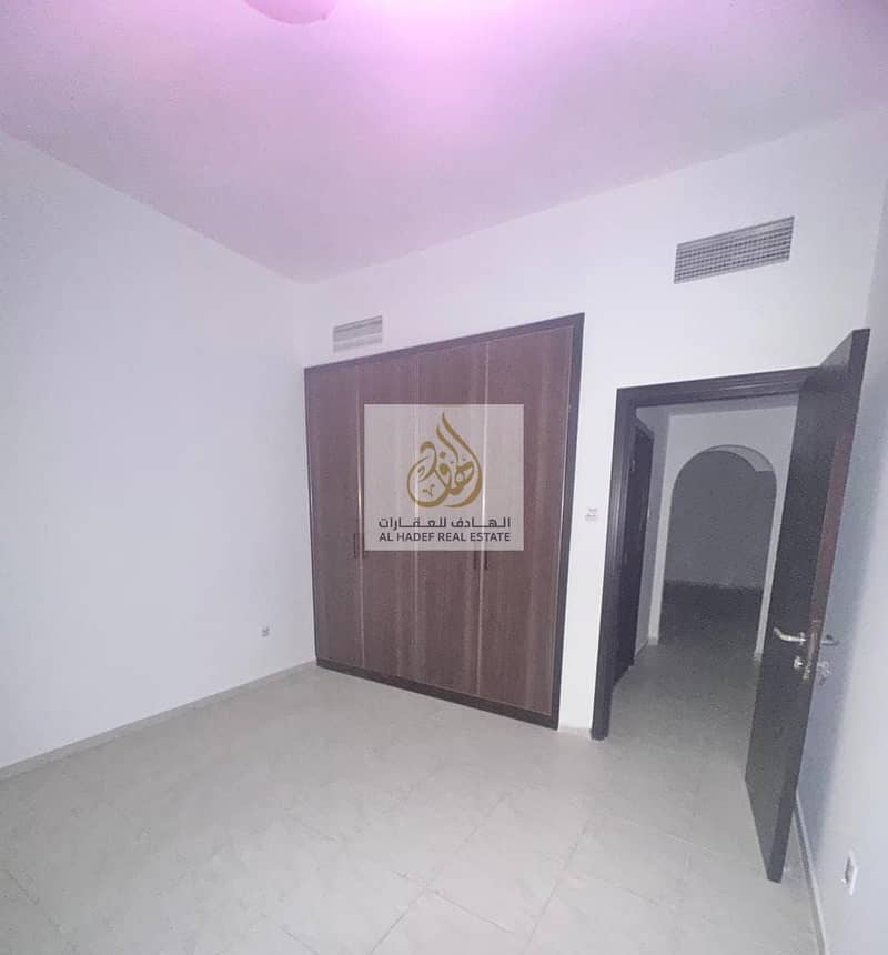 For annual rent in Ajman, exclusive week offer, two rooms and a hall are available, wall cabinets with 2 bathrooms, in Al Nuaimiya 3, behind Al Murad