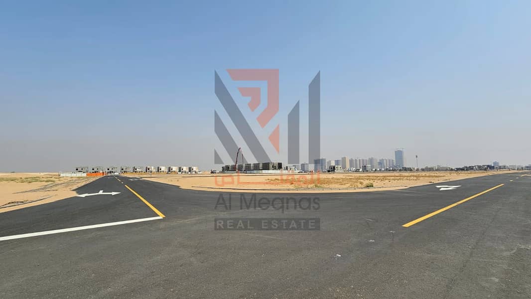 In installments, residential investment lands, Al Helio , a distinguished location near Al Watan University, freehold, including fees