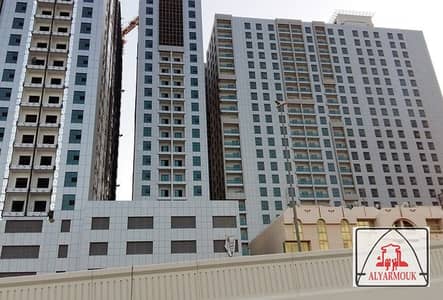 PAY JUST 175,000/= & GET TWO  BEDROOM HALL OPEN VIEW WITH BALCONY IN CITY TOWER AJMAN