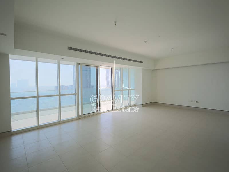 12 spacious-big-livng-room-with-glass-panels-facing-towards-the-Amazing-views-and-the-blue-sky-in-parkside-Residence. jpg