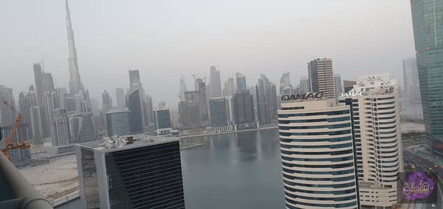 Studio for Rent in Business Bay, Dubai - Burj View and Canal View | Vacant | Spacious