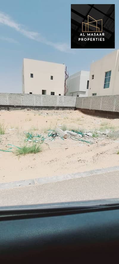 Townhouse land for sale in Ajman Al Yasmeen, including registration fees, excellent location, freehold, for all nationalities