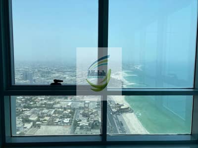 2 Bedrooms Apartment with Sea View Available in Corniche Tower, Ajman