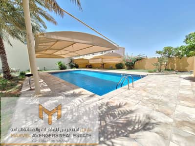 Luxury Compound// 4BED Villa with Maidroom And Private Back Yard + Sharing Swimming Pool For Rent MBZ