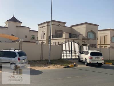 For sale, a corner villa in the Emirate of Sharjah, Al Suyouh area, 7, a two-storey villa on an area of 12,000 feet, a newly built villa at a great
