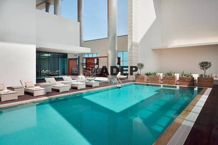 2 Bedroom Flat for Rent in Airport Street, Abu Dhabi - rooftop-pool. jpg
