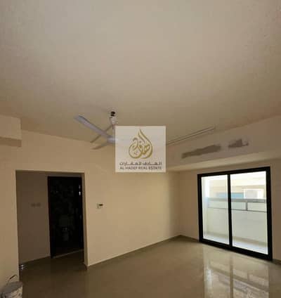 For annual rent Ajman room and hall first inhabitant super deluxe 2 bathrooms with balcony Al Bustan area