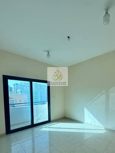 For the annual rent in Ajman, a room and a hall Al Nuaimiya 1, a very large area, 2 bathrooms with a balcony, close to Al Hikma School