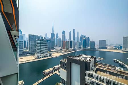 2 Bedroom Apartment for Sale in Business Bay, Dubai - Burj Khalifa & Canal View | Investor Deal