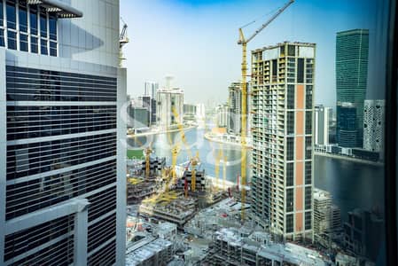 مکتب  للايجار في الخليج التجاري، دبي - مکتب في برج بايز ووتر،الخليج التجاري 140000 درهم - 8965099