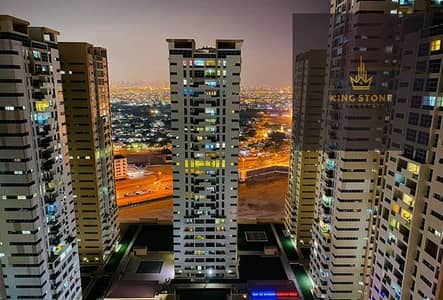 For sale, a two-room apartment and a hall in Ajman Towers, One Tower 1, Al Sawan, Ajman, area 1616
