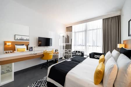 شقة فندقية  للبيع في برشا هايتس (تيكوم)، دبي - شقة فندقية في فندق سكاي سنتر،برشا هايتس (تيكوم) 800000 درهم - 8966186