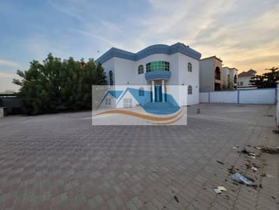 Villa for rent in Al Rawda 2, area 10,000 square feet, corner on two streets, price is negotiable