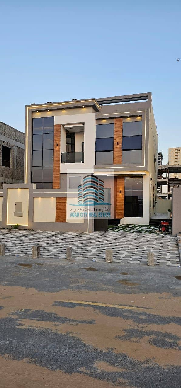 For sale, a villa in Ajman, freehold, super deluxe finishing, without down payment, and the price includes registration fees