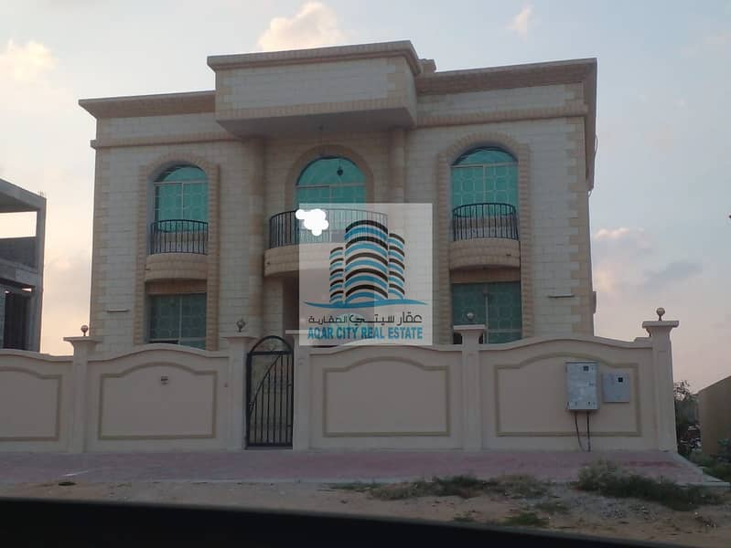 A distinctive residential and commercial villa in Al Mowaihat 2, excellent location and excellent spaces with air conditioning