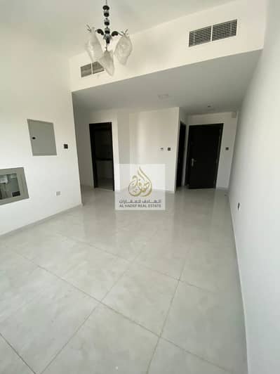 1 Bedroom Apartment for Rent in Corniche Ajman, Ajman - A large room and hall, 2 bathrooms and a balcony, close to the Corniche, super deluxe finishes.