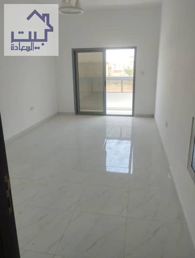 For rent in Ajman, Al Rawda Studio 2, first inhabitant, with balcony, very close to the Dubai and Sharjah exit, very close to all services, payment fa