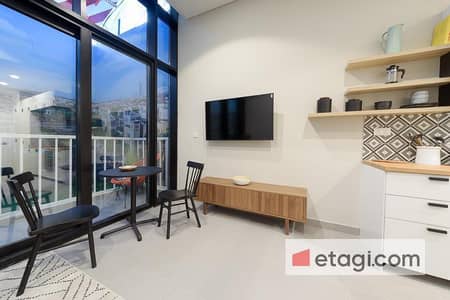Studio for Sale in Jumeirah Village Triangle (JVT), Dubai - The Community | Mid Floor | Fully Furnished