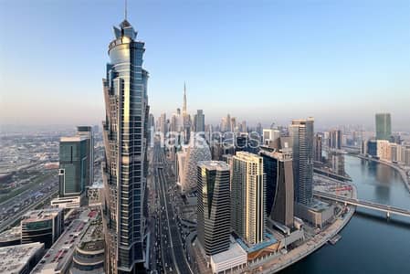 3 Bedroom Apartment for Rent in Business Bay, Dubai - Great price | Burj and Sea View | 3 BHK + Maid