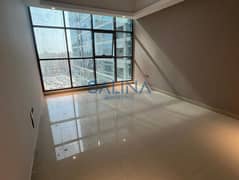 FOR RESALE: A high-floor apartment with private parking and a balcony, offering a wonderful view of Khalifa Main Street.
